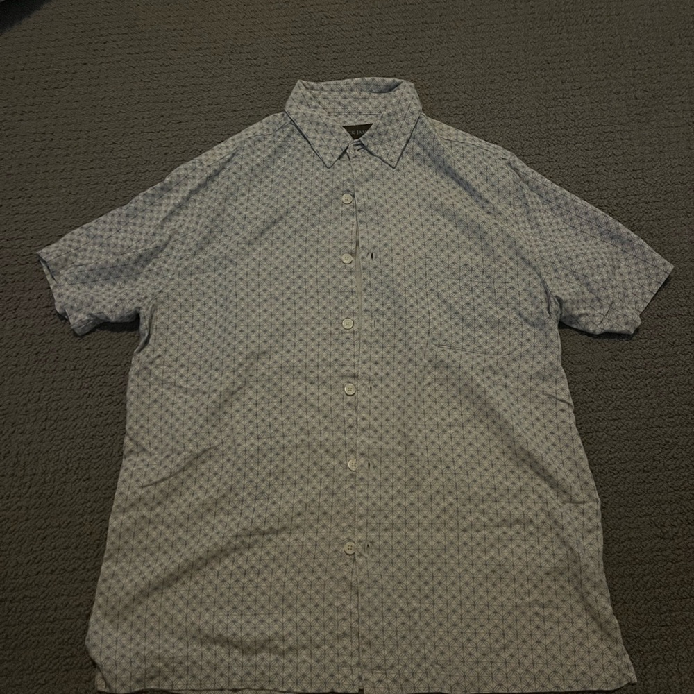 Blue Polo Shirt with Subtle Pattern